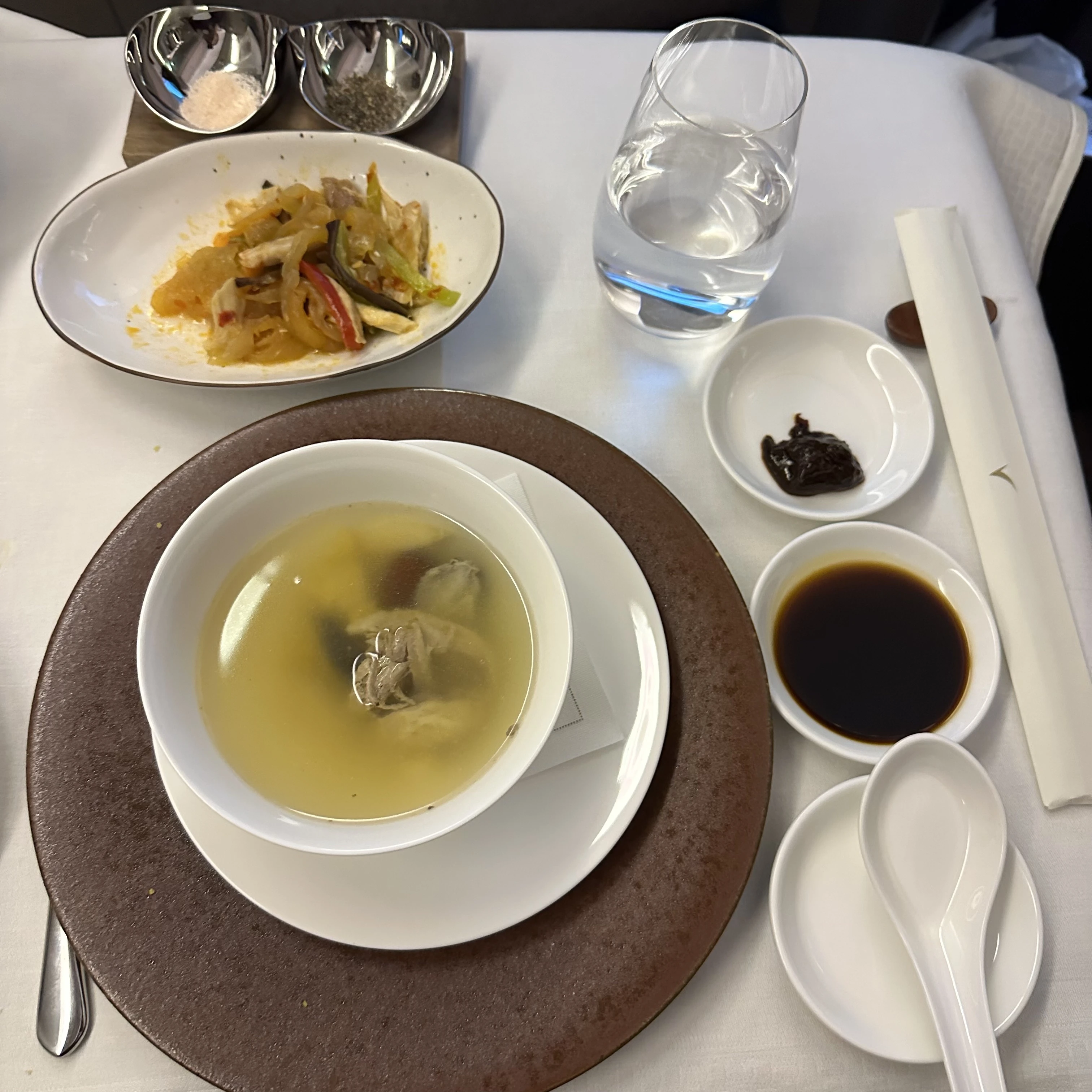 Cathay Pacific First Class gourmet appetizers and soup served inflight.