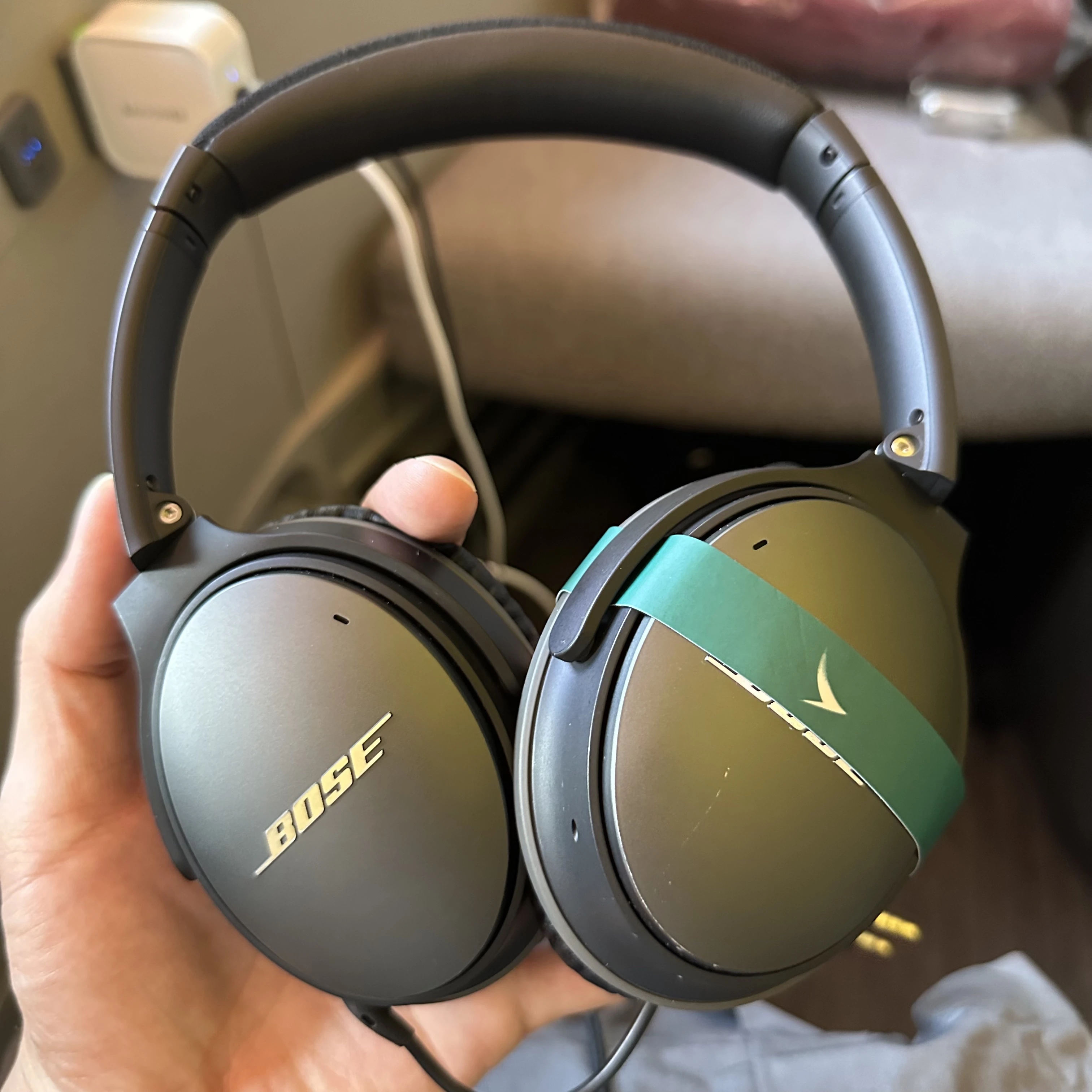 Cathay Pacific Boeing 777-300ER First Class noise-cancelling headphones.