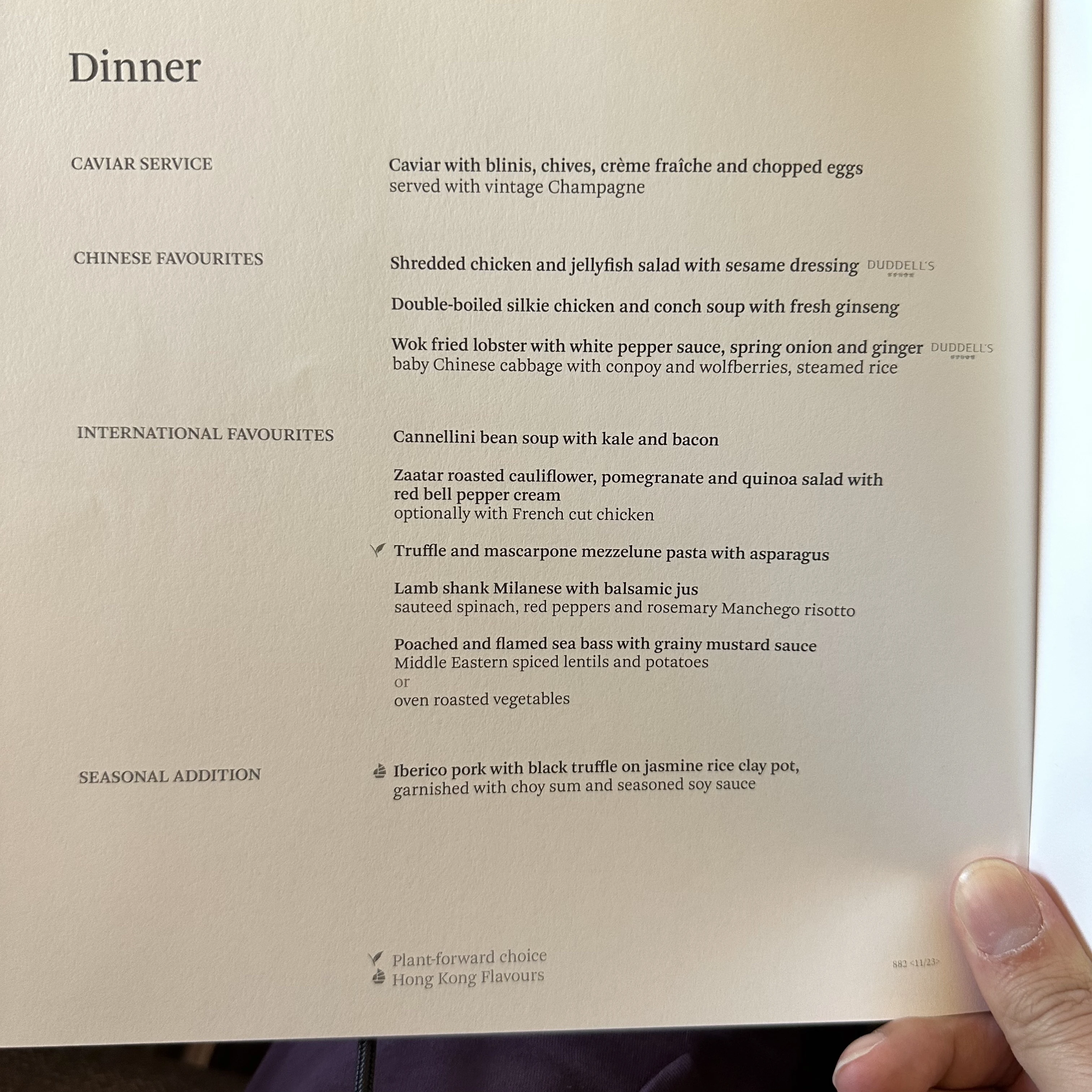 Cathay Pacific First Class dinner menu featuring fine dining options for passengers.