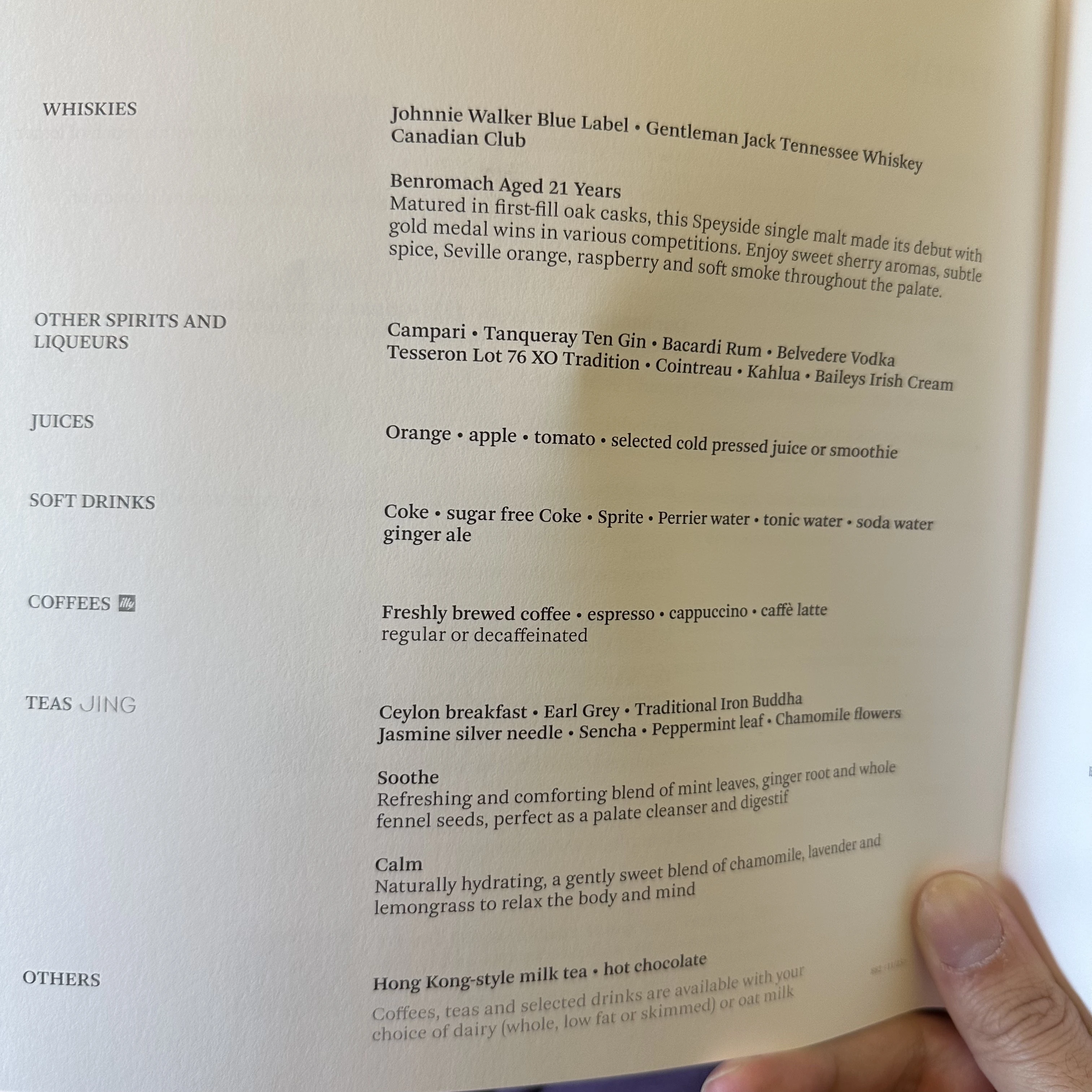 Cathay Pacific First Class beverage menu showcasing non-alcoholic drink options..