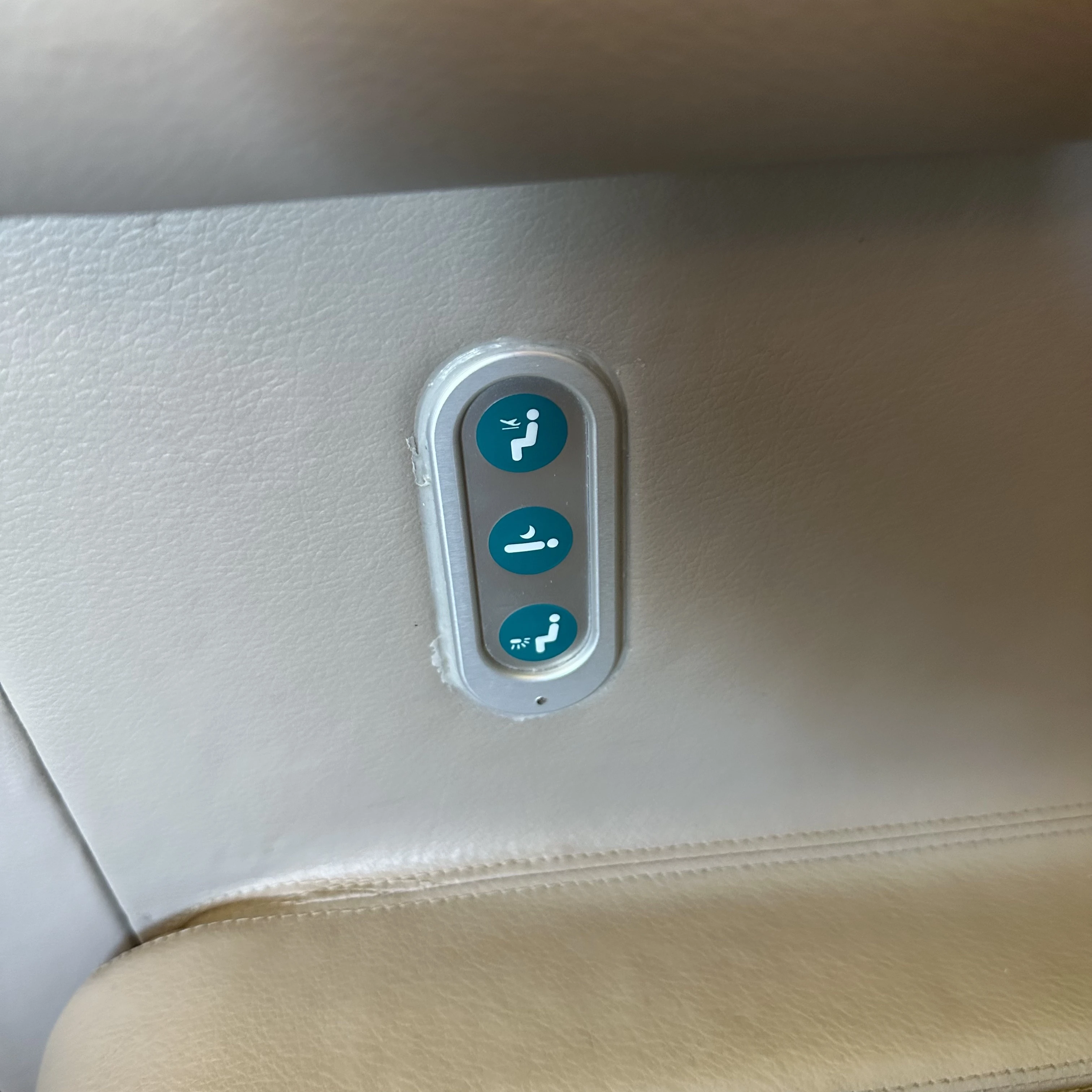 Cathay Pacific Boeing 777-300ER First Class seat controls.