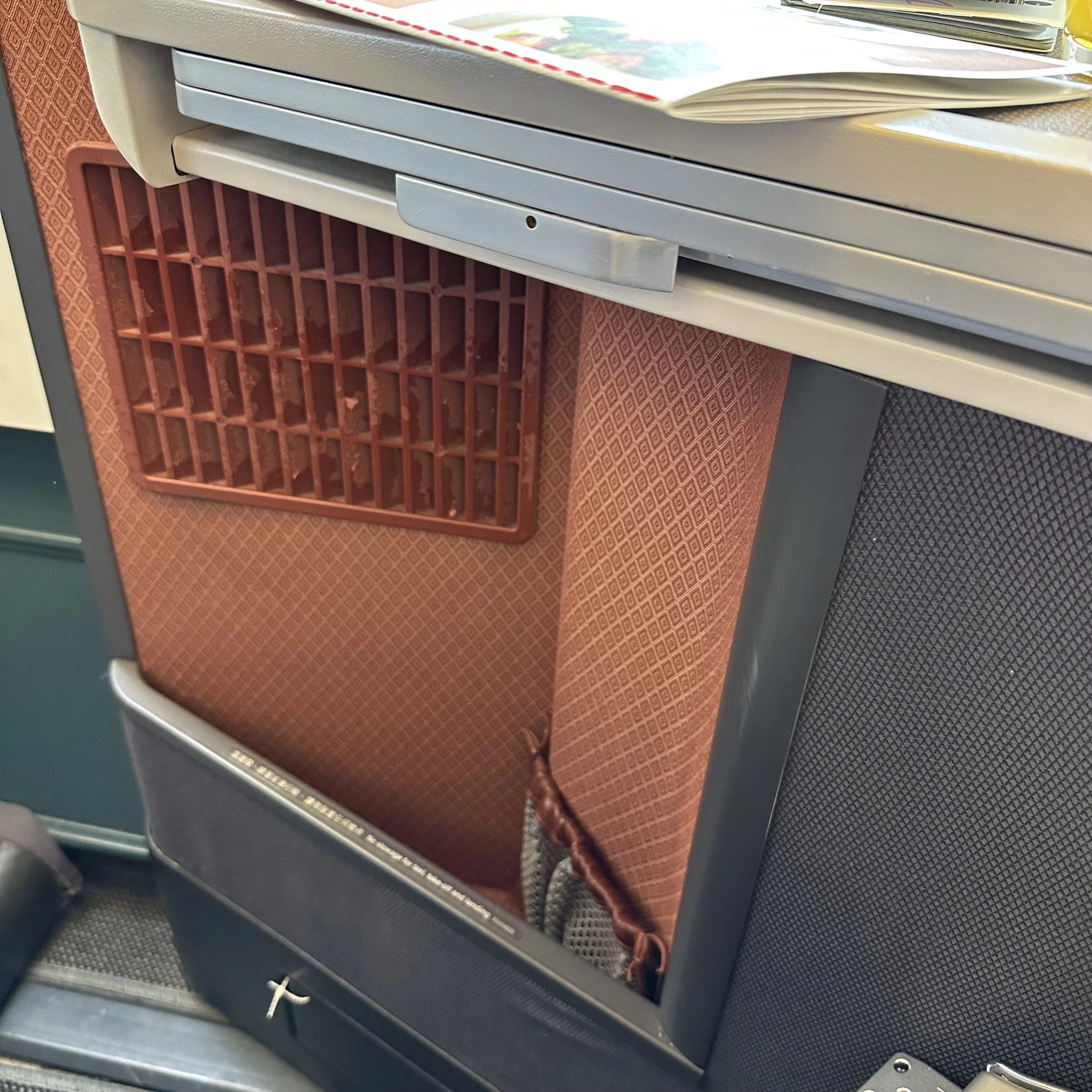 Cathay Pacific Airbus A330-300 business class seat extra storage.