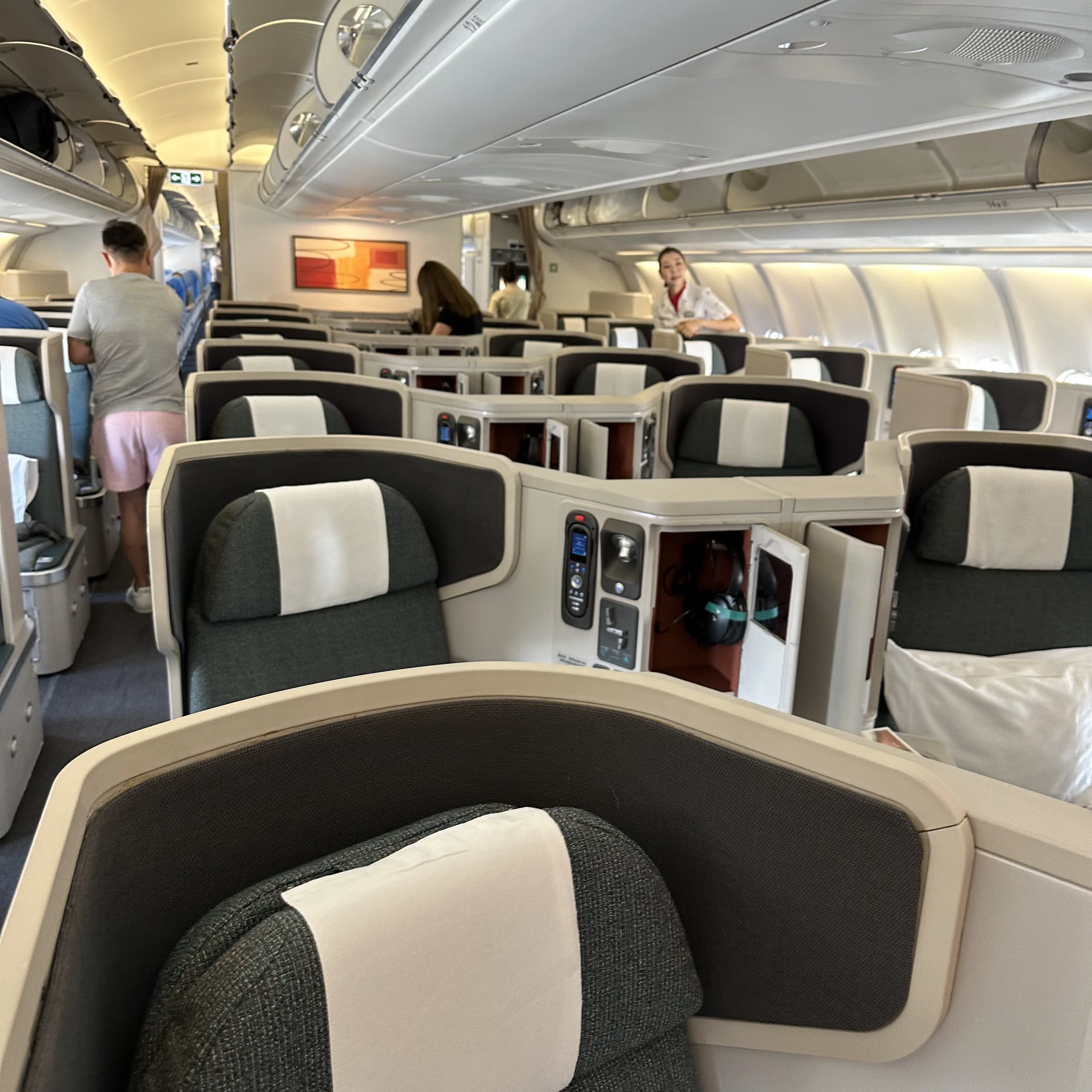 Cathay Pacific Airbus A330-300 business class seats are in a 1-2-1 configuration with direct aisle access.