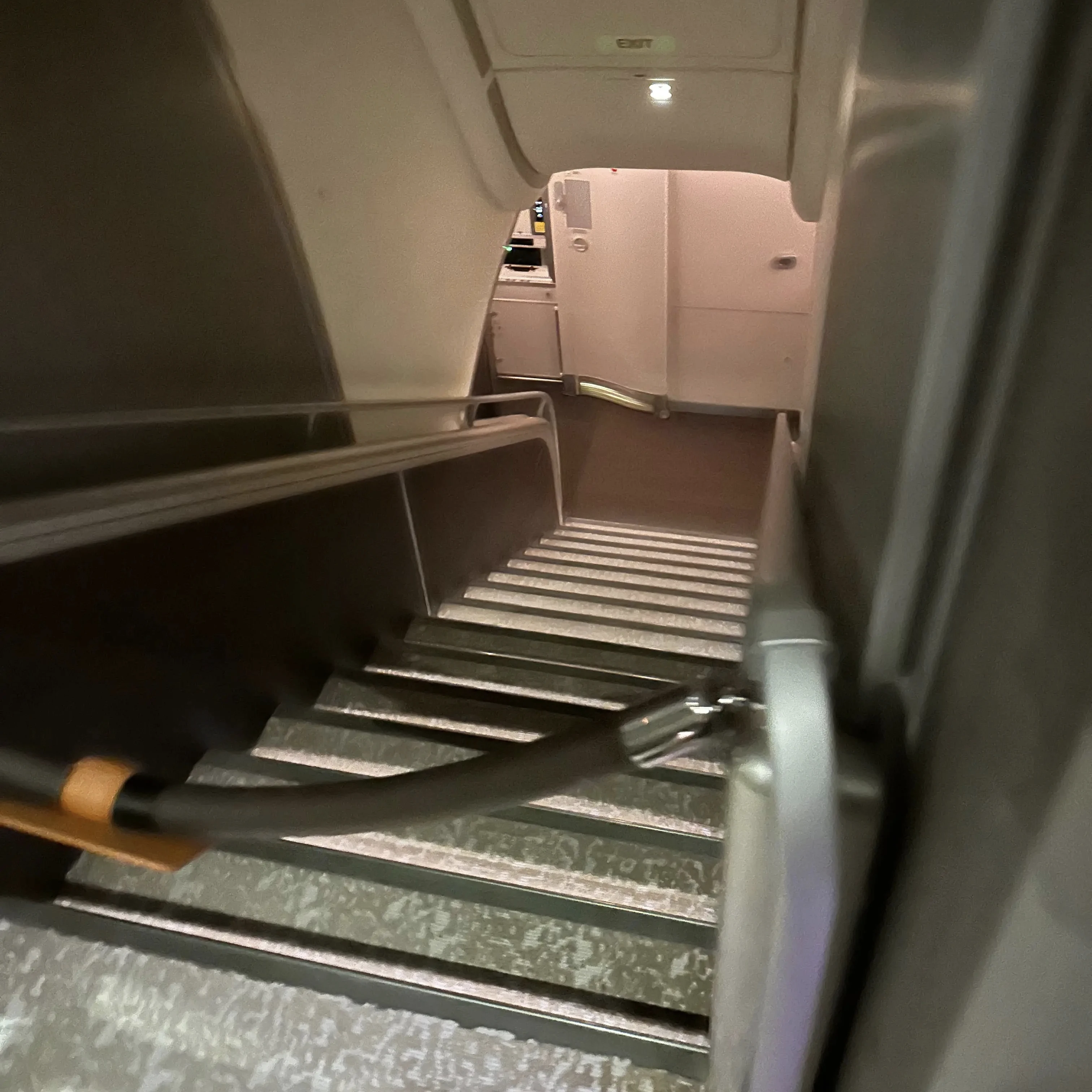 Singapore Airlines A380-800 First Class Suites staircase.